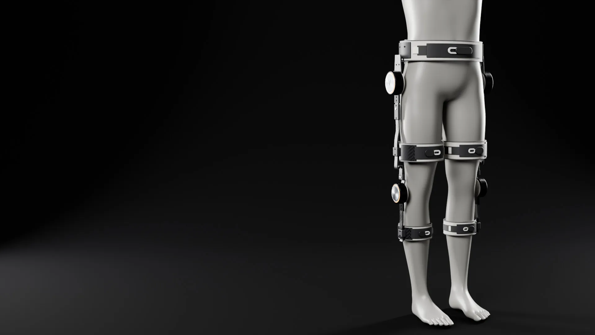 Veema Exo worn on a grey display mannequin, three quarter view: knit belt, hip joints with amber rings, carbon struts, knee joints and cuffs
